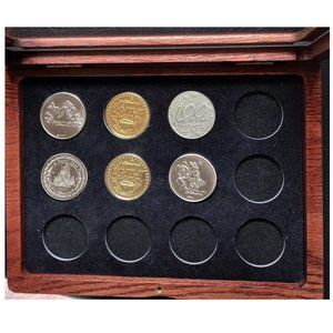 DISNEY 100 YEARS OF MAGIC SHARE A DREAM COME TRUE COINS SERIES - 7 Coins Only